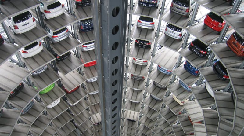 vehicles parked inside elevated parking lot