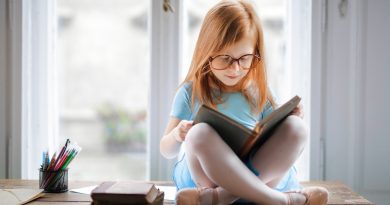 photo of girl reading book