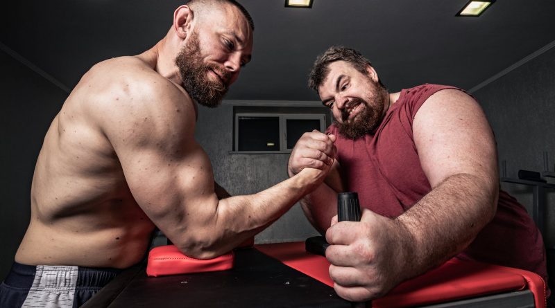 competitive men arm wrestling